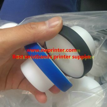 Holders for silicone wristbands printers